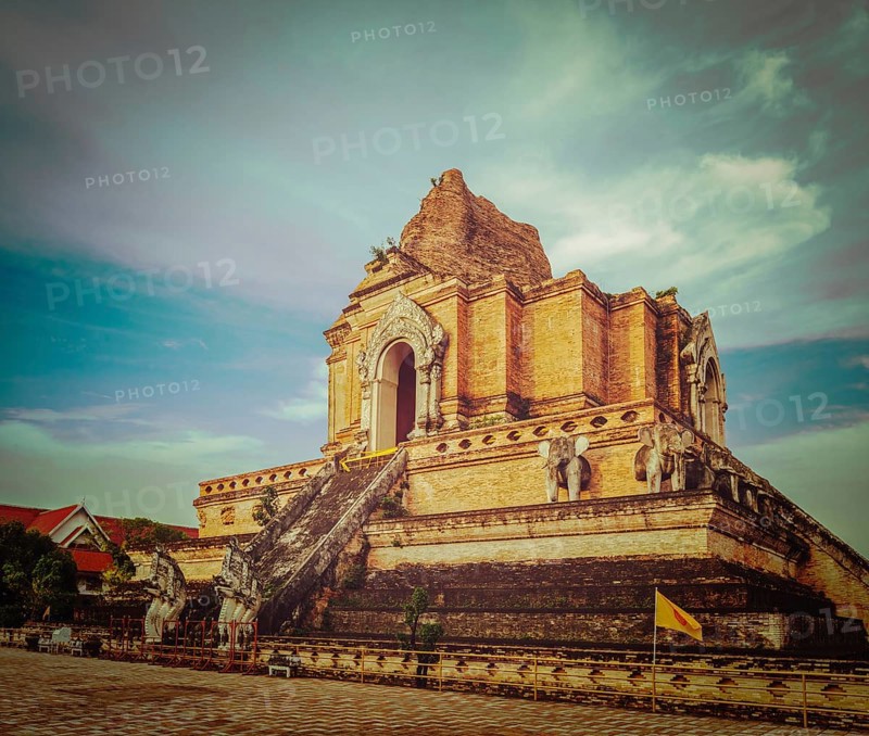 Vintage retro hipster style travel image of Buddhist temple Wat Chedi Luang. Chiang Mai