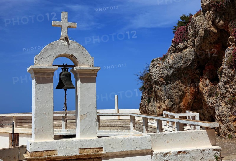 Bell tower of the monastery in the mountains near the coastal road to Agios Nikolaos