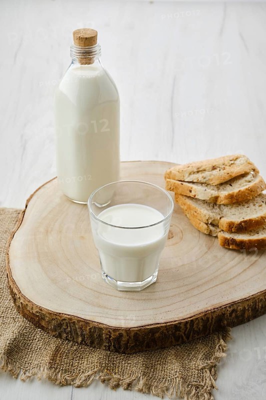 Bottle and a glass of fresh milk