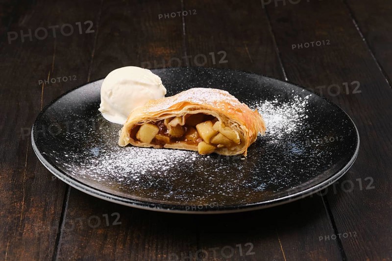 Piece of classic apple strudel on a plate