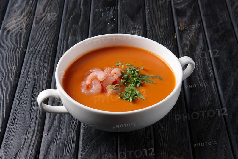 Rustic tomato soup with shrimps