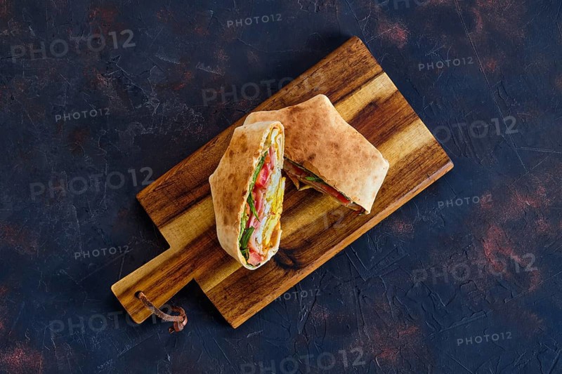Top view of pita bread stuffed with ham