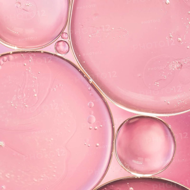 Translucent oil drops liquid smooth rose blurred background. Resolution and high quality beautiful photo