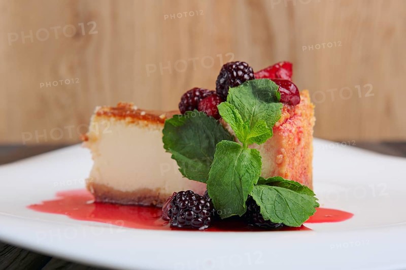 Piece of cheesecake with cherry