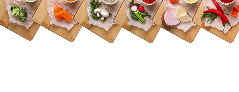 Variety of colorful vegetables and ingredients for cream soups top view isolated on white