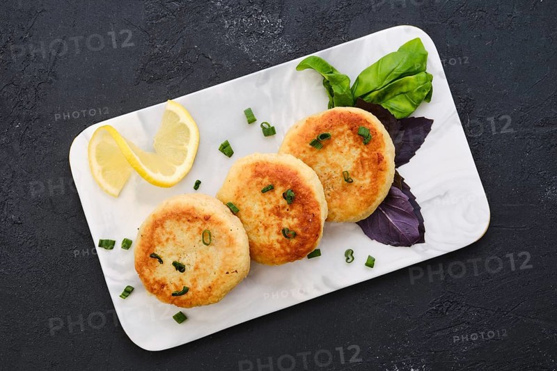 Top view of fried cod meat cutlet