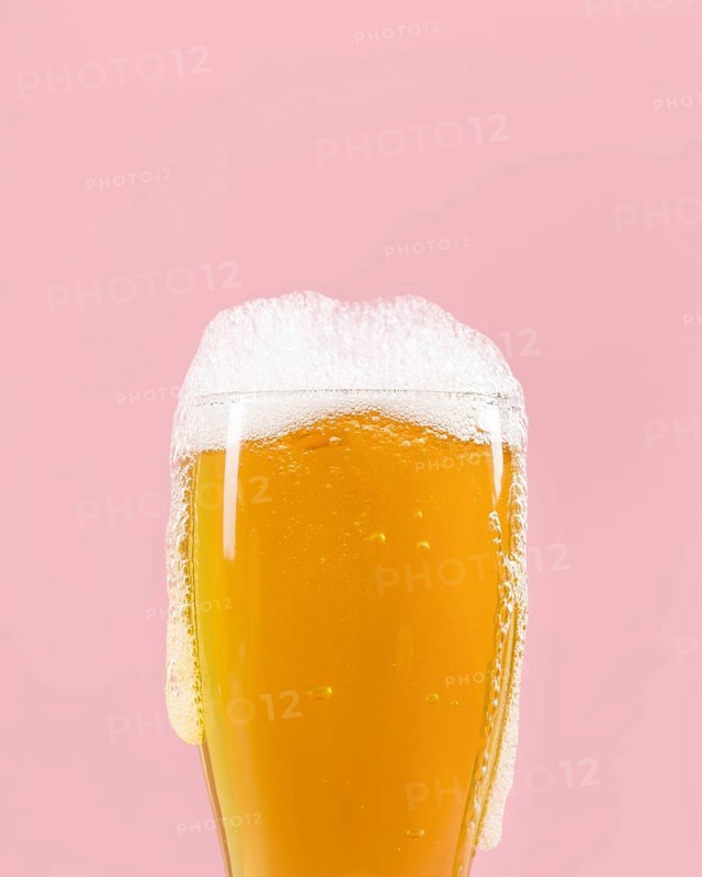 Glass with beer having foam