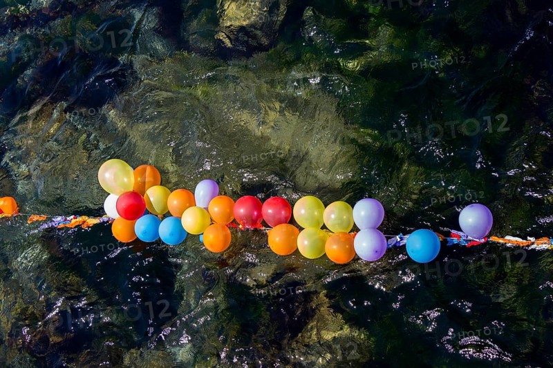 Balloons in shooting range as targets on water