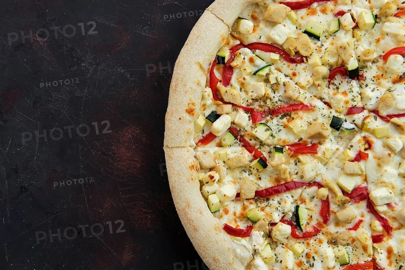 Close up view of pizza with chicken