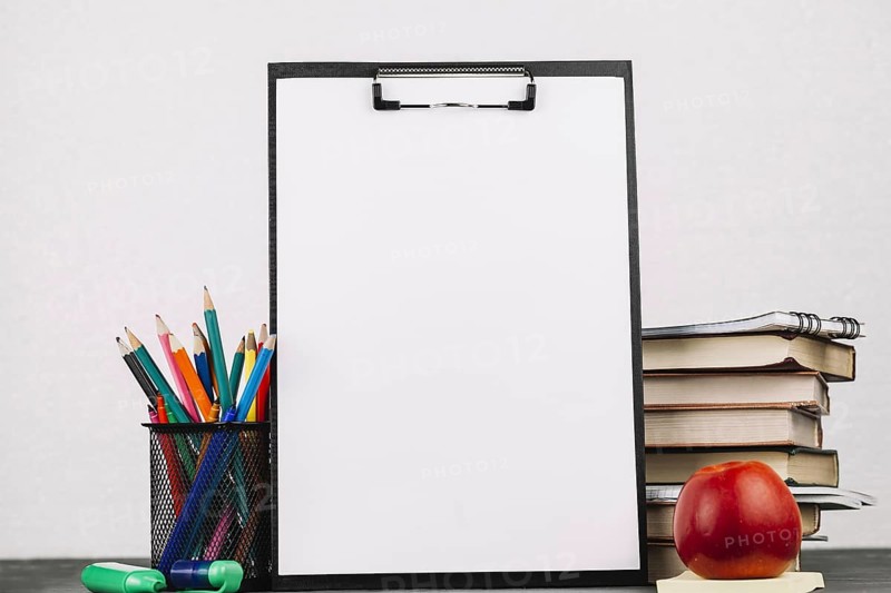 School supplies around easel