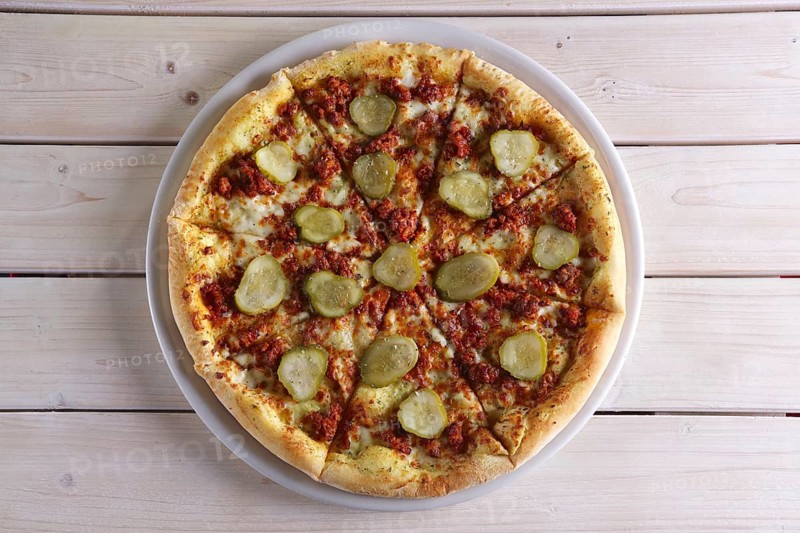 Double cheese pizza with pickled cucumber
