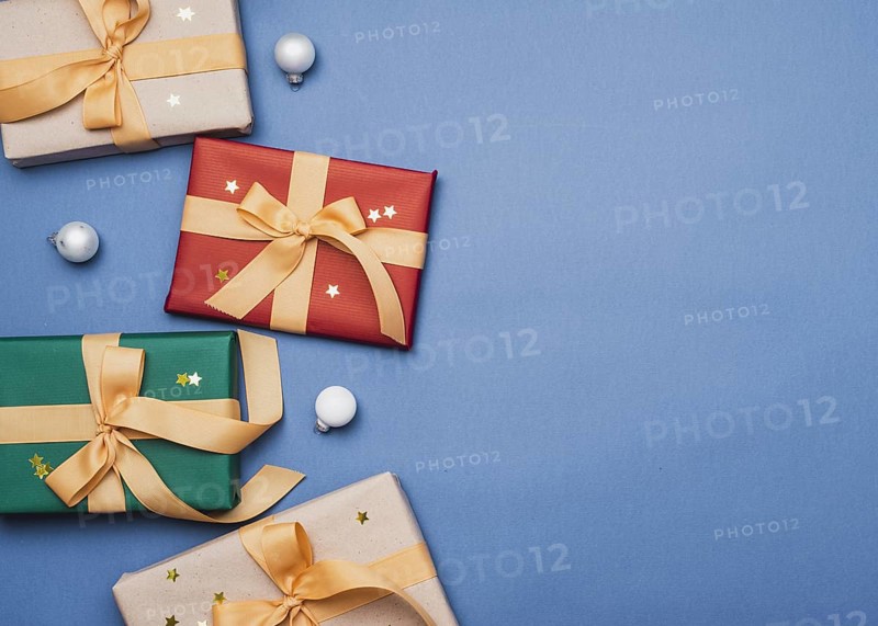 Colorful presents with ribbon blue background