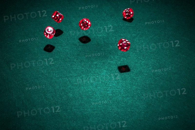 Red casino dice poker table