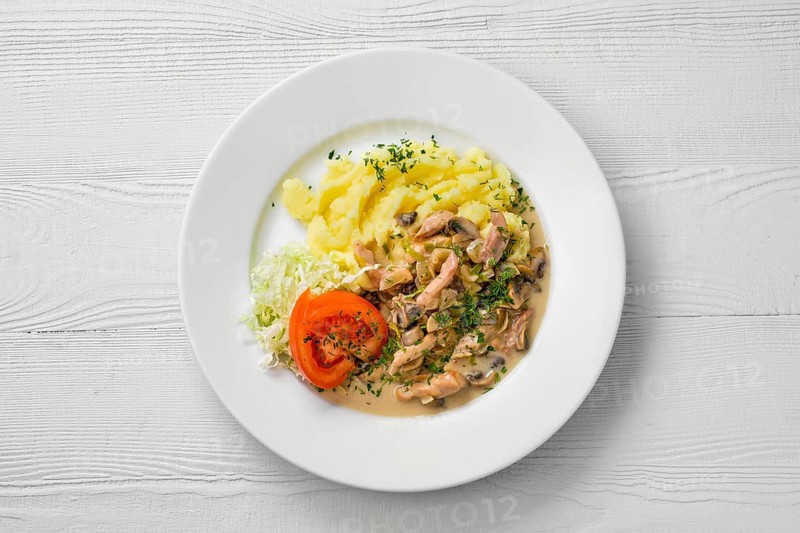 Top view of plate with chicken goulash