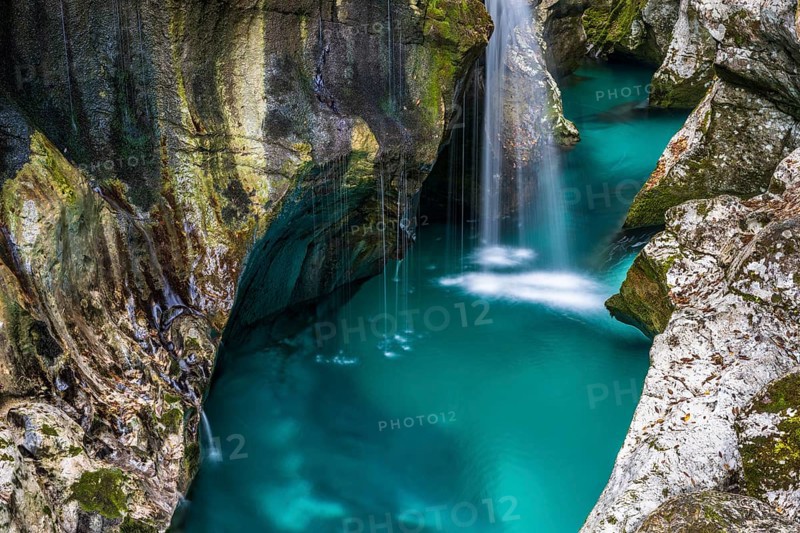 Mountain river Soca flows through narrow canyon