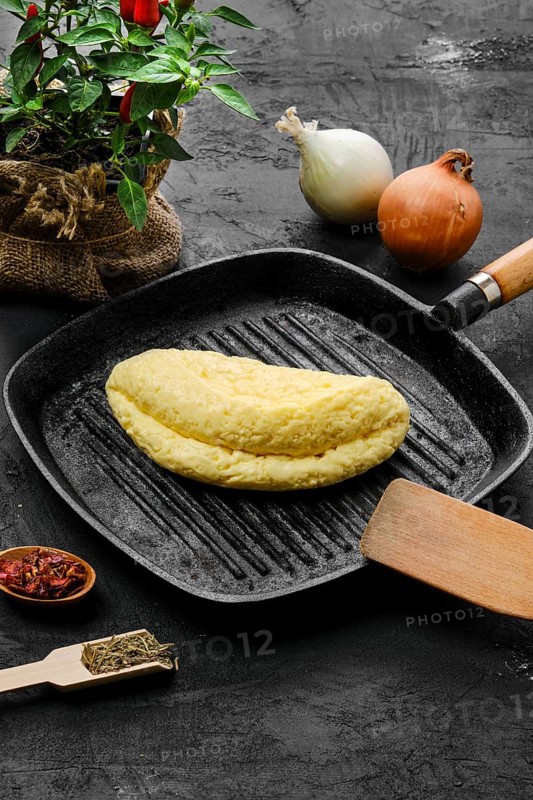Homemade cheese for frying on cast iron grill pan