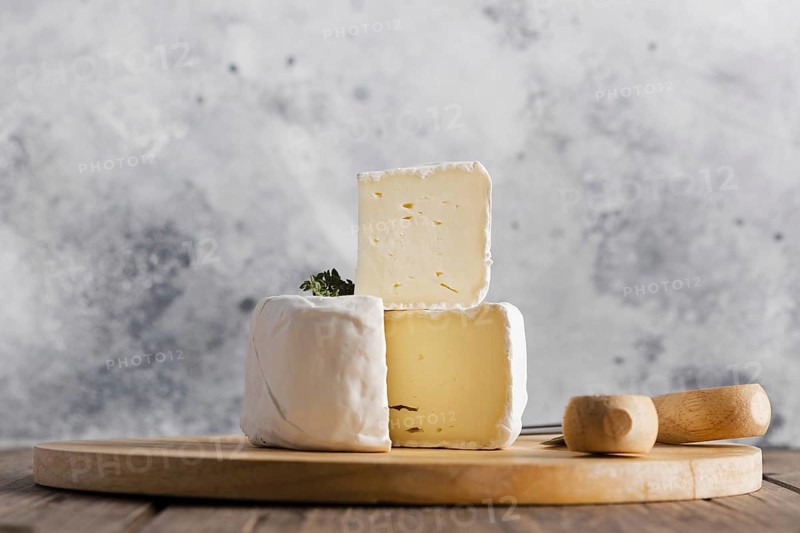 Close up camembert slice top roll