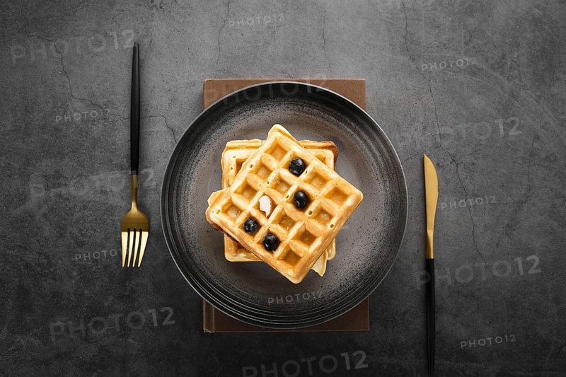 Top view set two waffles with gold cutlery. Resolution and high quality beautiful photo
