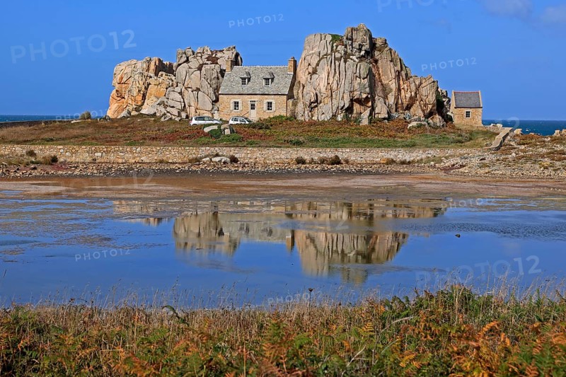 Country house between rocks near Le Gouffre