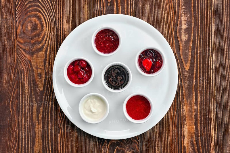 Overhead view of assortment of fruit puree. Jam