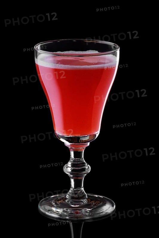 Glass of strawberry daiquiri cocktail isolated on black background background