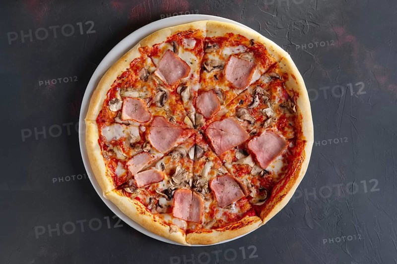 Pizza with ham and mushrooms