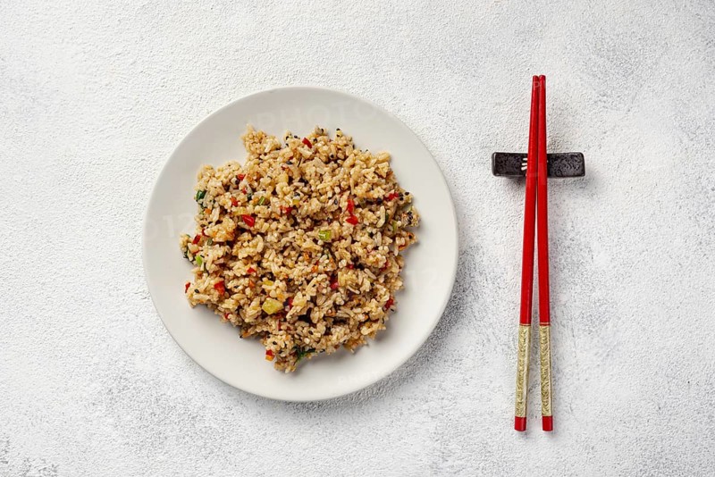Top view rice with vegetables plate chopsticks. Resolution and high quality beautiful photo