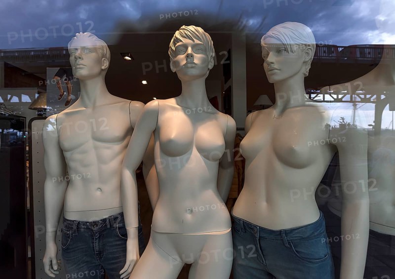 Half-naked mannequins in a fashion shop