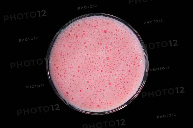 Top view of glass of smoothies isolated on black