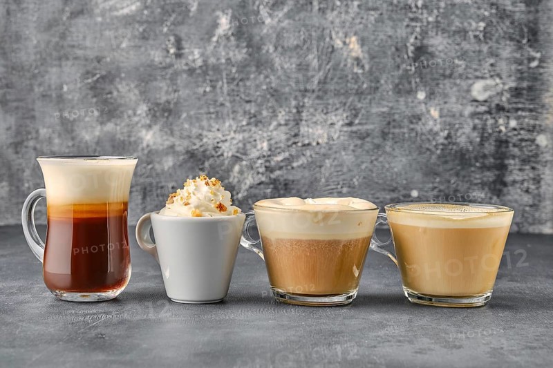 Variation of coffee drinks on shabby background