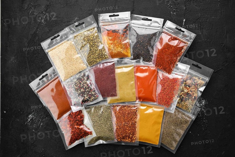 Overhead view of different spices in plastic package