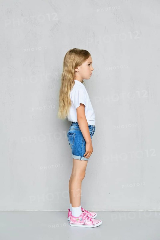 Little child girl in white t-shirt