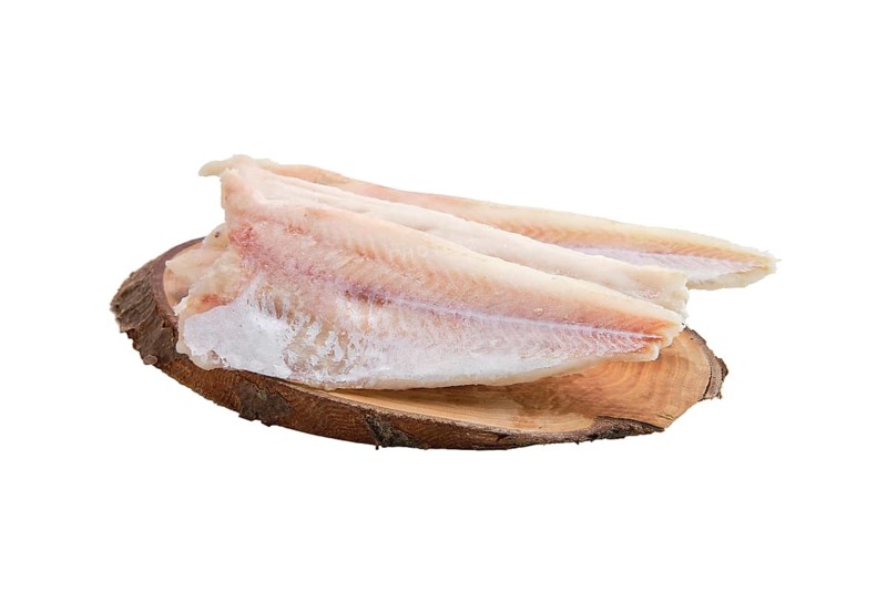 Frozen fillet of pangasius isolated on white background