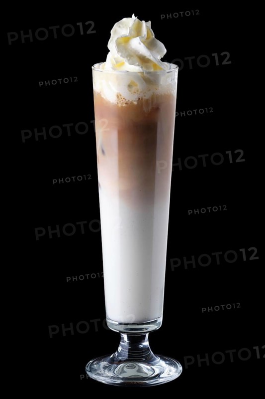 Tall narrow glass with iced coffee isolated on black background