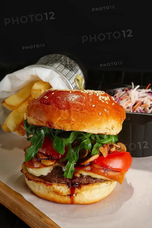 Juicy beef burger with lingonberry sauce