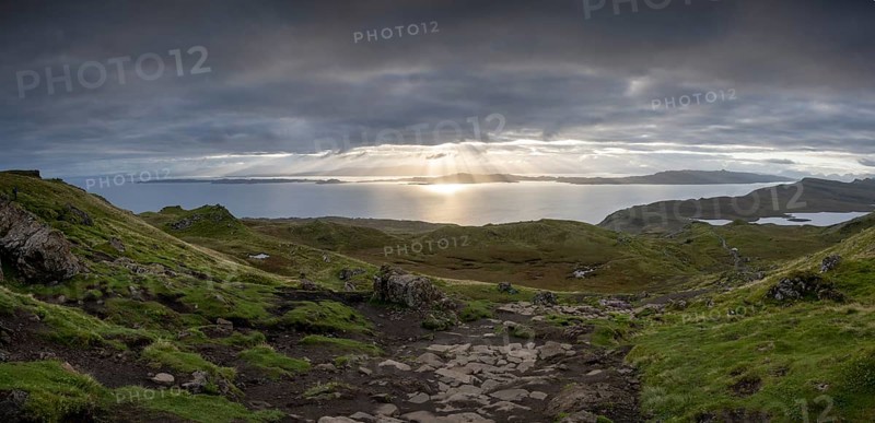 Sunbeams through sky