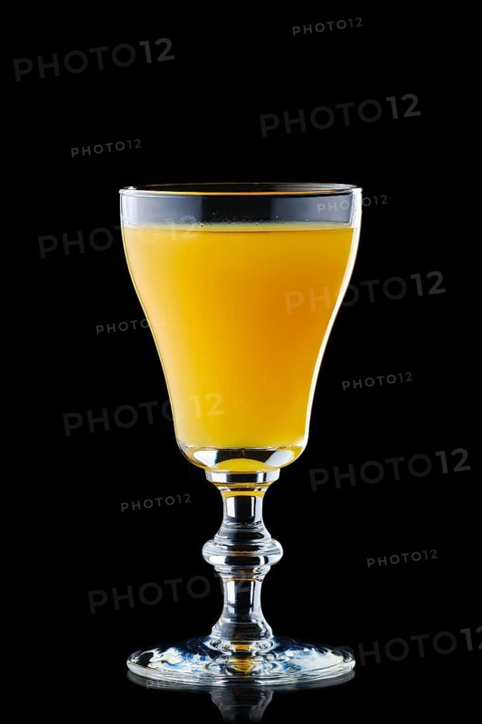 Glass with vodka and orange juice isolated on black background