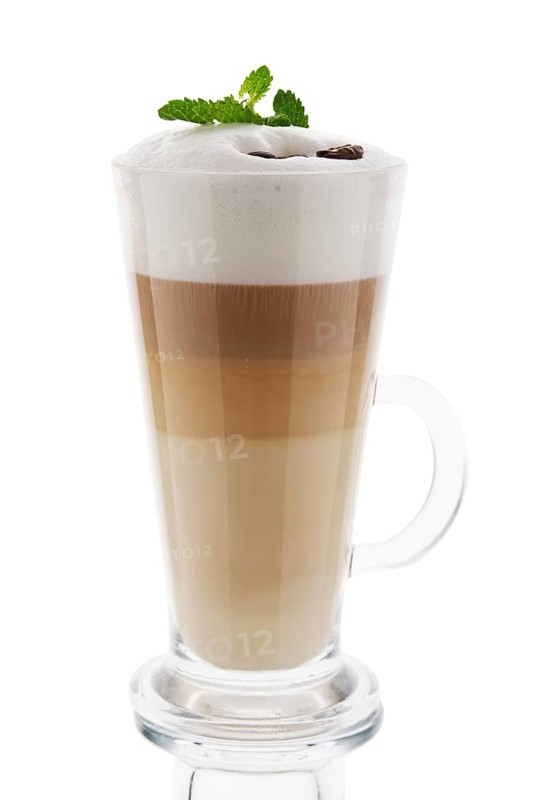 Cappuccino in tall glass isolated on white background
