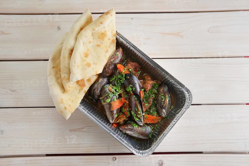 Baked oysters covered with bannock