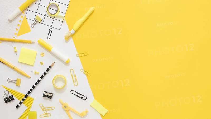 Flat lay office stationery with copy space paper clips