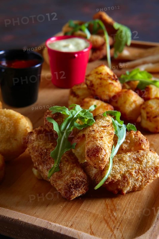 Wooden plate with snack for beer