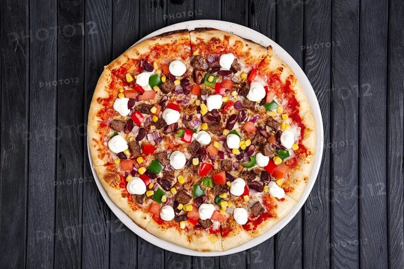 Top view of pizza with beef