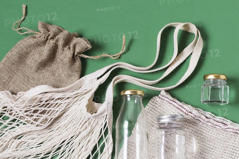 Top view different zero waste products green background. Resolution and high quality beautiful photo