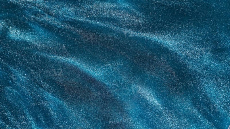 Particles azure dye water