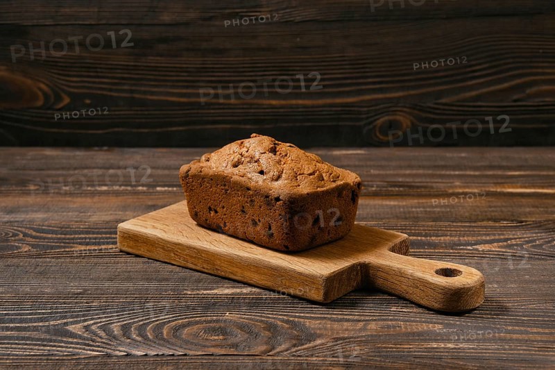 Whole uncut biscuit cake with raisins
