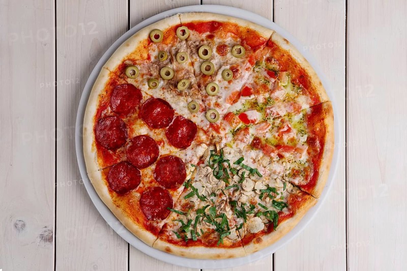 Top view of pizza four seasons