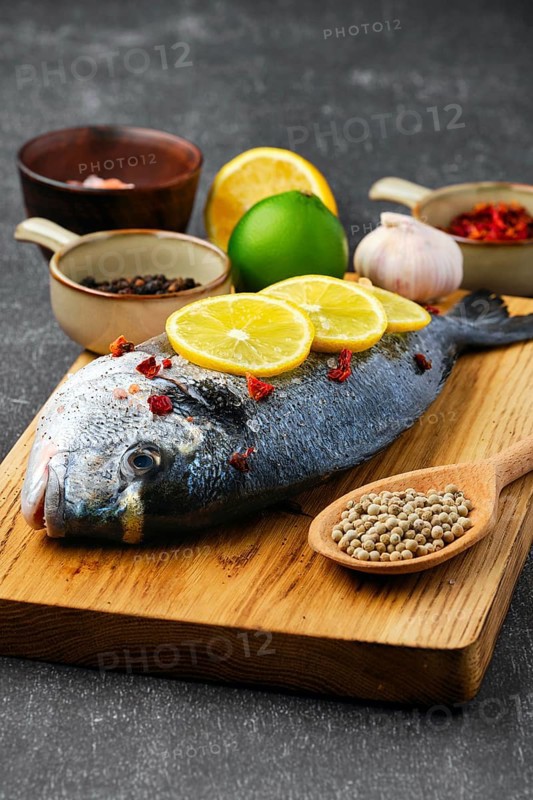 Gilt head bream with spice prepared for cooking