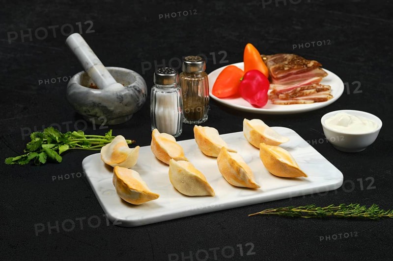 Frozen dumplings with bacon and mashed potato