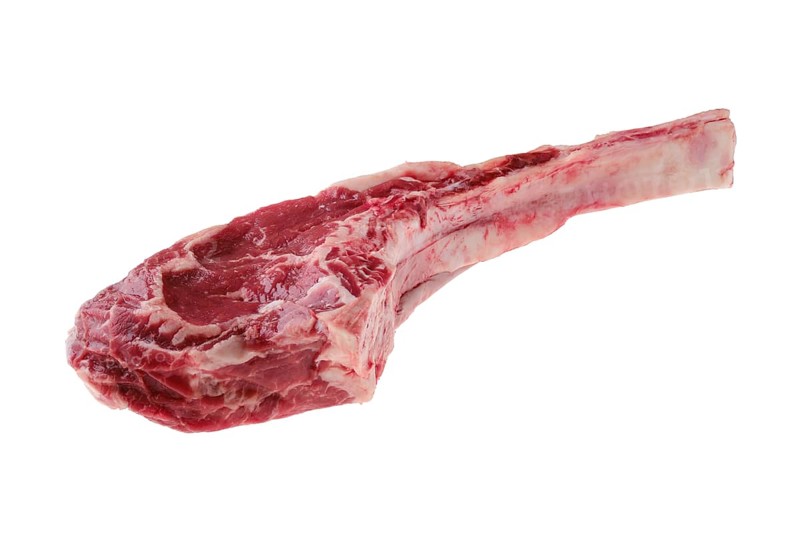 Raw beef cowboy steak