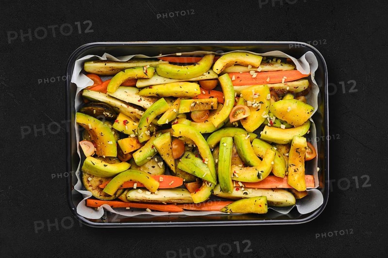 Spicy pumpkin and carrot in baking tray